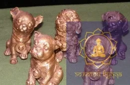 Щенки собаки бронза