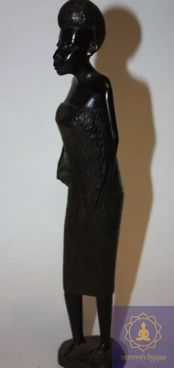 Дівчина — чорне дерево, Африка.