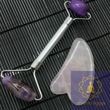 Масажний набір Гуа-ша, аметистовий ролик і скребок з рожевого кварцу.