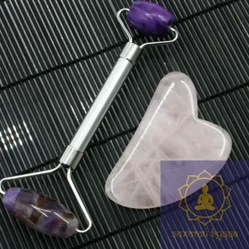 Масажний набір Гуа-ша, аметистовий ролик і скребок з рожевого кварцу.