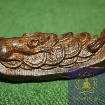 Щур на човні з грошима. Різь для дерева.