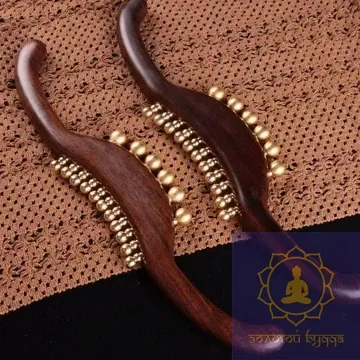 Массажер для меридиан из дерева с медными вставками.