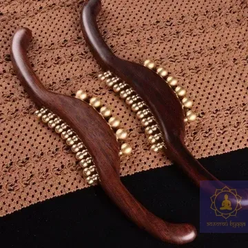 Массажер для меридиан из дерева с медными вставками.