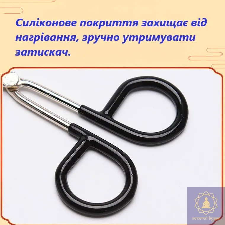 Металевий затискач для моксотерапії.