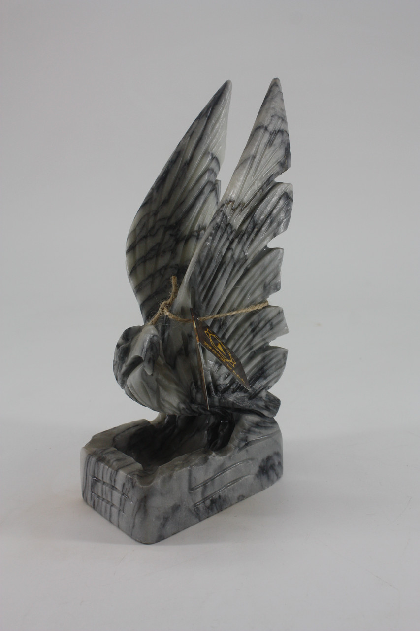 Фигурки, статуэтки из камня