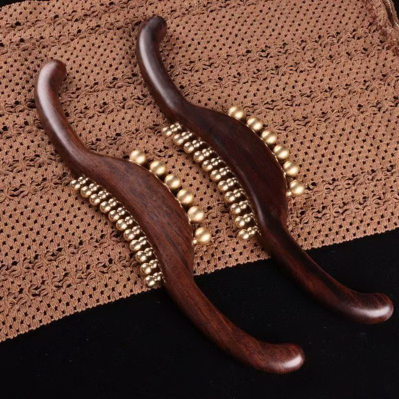 Массажер для меридиан из дерева с медными вставками.