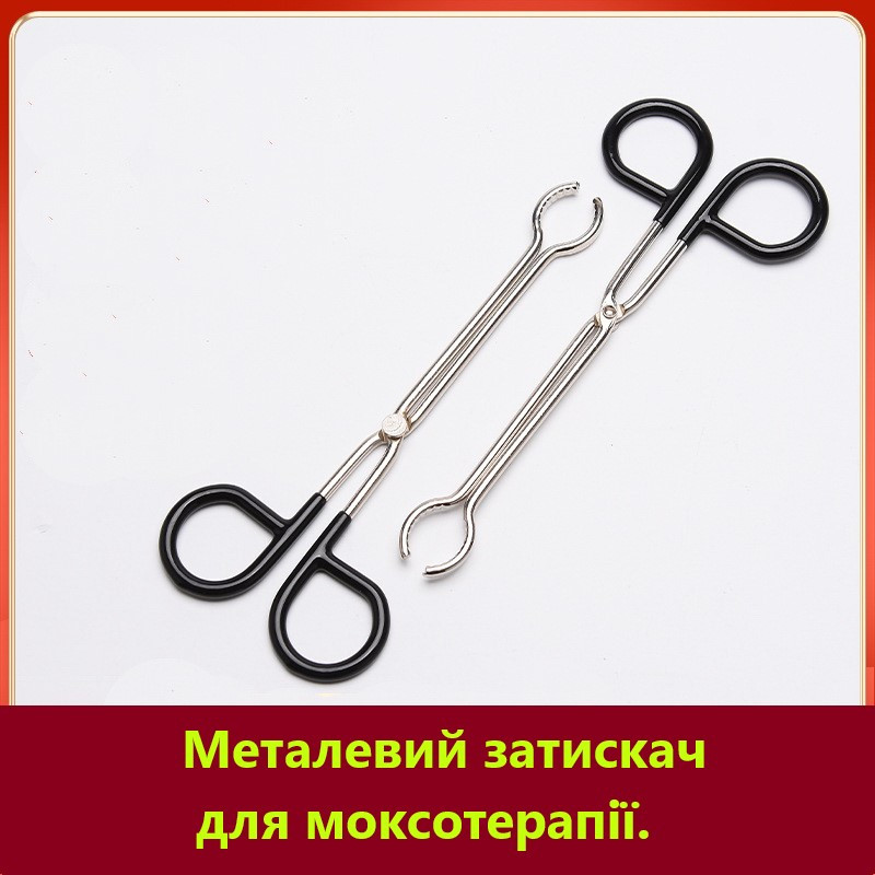 Металлический зажим для моксотерапии.